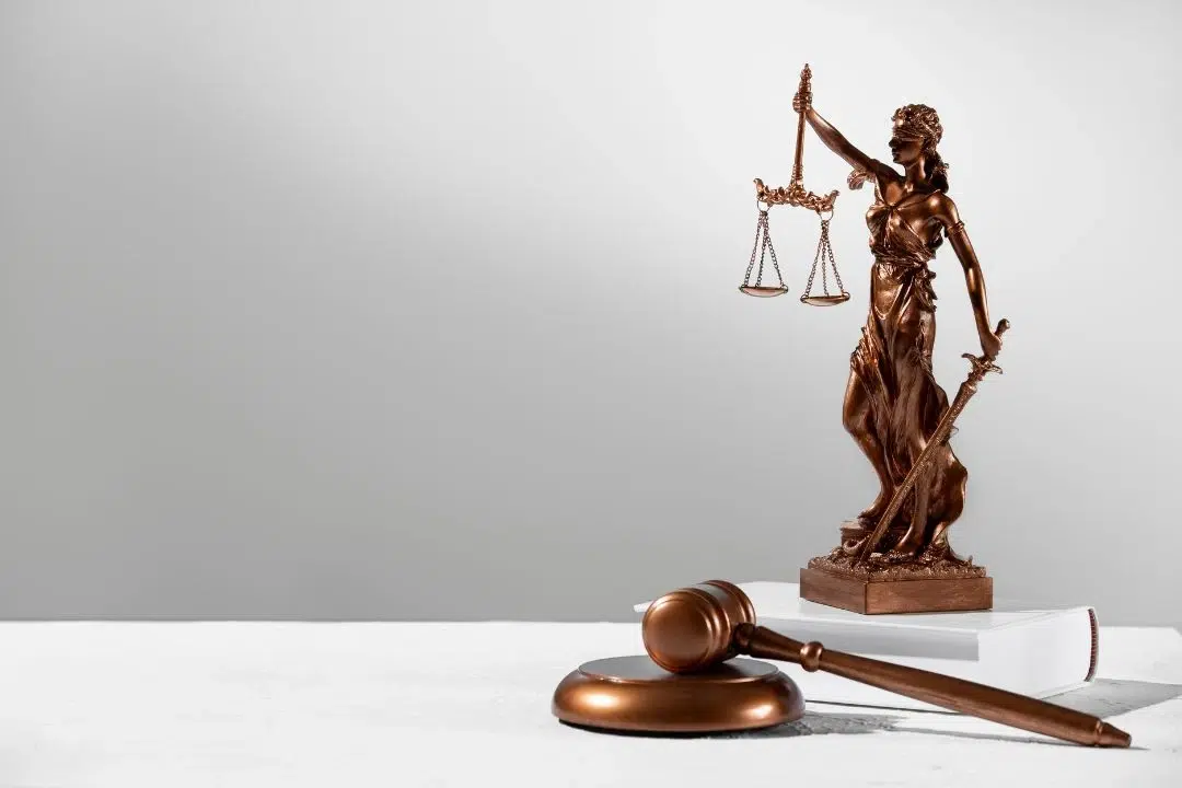 Lady Justice statue with gavel