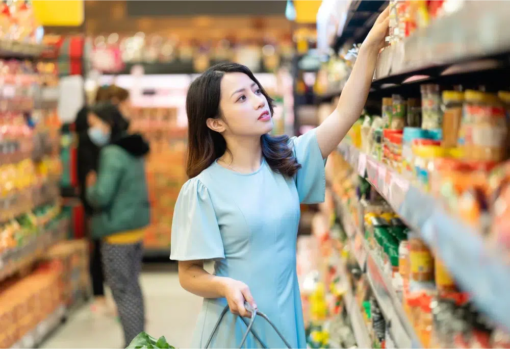 Woman shopping in grocery store